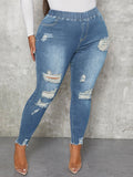 Taglie Forti Jeans skinny con strappati bordo grezzo