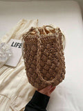Borsa a secchiello intrecciata in paglia