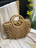 Borsa a mezzaluna con design traforato, borsa da spiaggia alla moda in paglia intrecciata, borsa da vacanza alla moda per l'estate