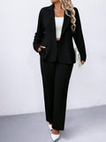Completo con giacca blazer con colletto a bavero in colore unito e pantaloni dritti larghi