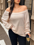 Maglione oversize in tinta unita con spalle scoperte e maniche lunghe, minimalista.