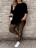 2 pezzi Completo da donna taglie comode con top a maniche lunghe nero casual e leggings con stampa leopardata, adatto per autunno e inverno