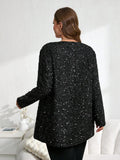 Cardigan ampio con paillettes decorative sul davanti in colore unito