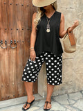 Set da 2 pezzi, con top a canotta scollo a V e orlo asimmetrico e pantaloni stampati a pois 3/4, casual e confortevole