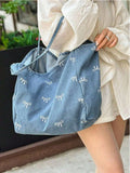 Borsa a tracolla casual versatile in tela lavata azzurra con fiocco, di moda coreana, attraente, adatta per pendolarismo, viaggi, shopping, ritorno a scuola, di grande capacità, elegante borsa da donna