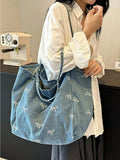 Borsa a tracolla casual versatile in tela lavata azzurra con fiocco, di moda coreana, attraente, adatta per pendolarismo, viaggi, shopping, ritorno a scuola, di grande capacità, elegante borsa da donna