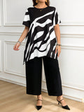 Set di top e pantaloni casual pendolari con stampa a colori a contrasto di taglia comodissima