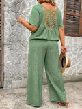 Set da 2 pezzi, composto da una camicia casual in stile lino di colore tinta unita con spacco sul retro e motivi floreali e tinta unita, e pantaloni regolari