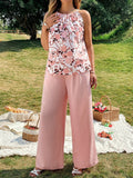 Completo da donna taglie forti in stile francese, composto da top a fascia stampato e pantaloni a gamba dritta