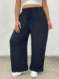Pantaloni larghi casual da donna taglie forti, di colore unito, con cintura