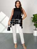 Blusa oversize alla moda con orlo rotondo e frangia, senza maniche