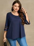 Blusa con dettagli di maniche in rete e collo asimmetrico