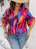 Blusa oversize da donna con scollo a V, con stampa geometrica colorata e volant