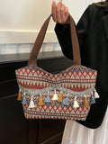 Borsa a spalla versatile di grande capacità alla moda, borsa a secchiello retrò con nappine
