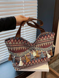 Borsa a spalla versatile di grande capacità alla moda, borsa a secchiello retrò con nappine