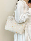 Nuova borsa a spalla oversize di moda, borsa a secchiello in paglia con pizzo a forma di crisantemo