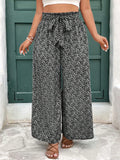 Pantaloni allargati da vacanza casual con vita annodata, di moda per l'estate, taglie comode