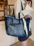 Borsa shopper in denim con effetto Tintura a nodi alla moda