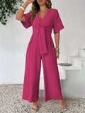 Tuta casual alla moda taglie forti, monocromatica, con scollo a V e vita annodata, stile vintage