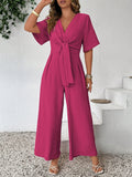 Tuta casual alla moda taglie forti, monocromatica, con scollo a V e vita annodata, stile vintage