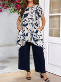 Set Abbigliamento stampato con motivi geometrici, top a maniche corte e pantaloni per donne taglia comoda