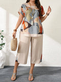 Set da donna taglie forti, 2 pezzi: top a maniche corte con scollo rotondo e stampa geometrica, pantaloni 7/8, adatto per primavera/estate