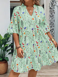 Vestito da donna taglie forti con scollo a V, con motivo floreale a ramoscelli e balza morbida
