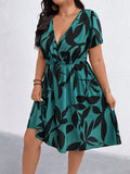 Abito da vacanza oversize per donna con stampa floreale, scollo a V e maniche a sbuffo