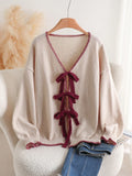 Cardigan in maglia elegante e casual di stile francese romantico, con bordo a pied-de-poule