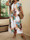 Abito casual a midi lunghezza con scollo a V e maniche corte, con stampa a piante tropicali, disponibile in taglie forti per donne