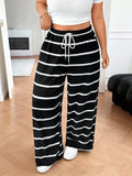 Pantaloni dritti casual taglia grande a righe bianche e nere