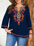 Maglietta casual comoda con scollo a V, di taglia oversize, con stampa floreale rossa e dorata su sfondo