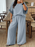 Set casual da 2 pezzi, composto da top ampio in tinta unita e pantaloni a gamba larga, taglie comode
