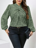 Blusa elegante con maniche a lanterna e scollo a V