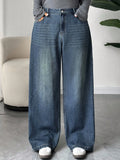 Jeans di jeans larghi e ampi in lavaggio scuro, taglie comode, adatti per tutte le stagioni