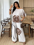 Set Donna taglie forti Top con colletto asimmetrico stampato e pantaloni a gamba dritta