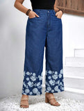 Taglie Forti Jeans con stampa floreale gamba ampia