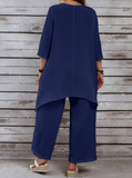 Top oversize con tasche e pantaloni abbinati per donne taglie forti, set casual di lino bianco con orlo asimmetrico e maniche a tre quarti