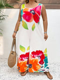 Tuta lunga elegante in stile ampio con scollo a ciambella, senza maniche, con stampa floreale colorata