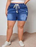 Pantaloncini in jeans con vita regolabile e strappi,in taglie comode, con tasche e orlo sfrangiato