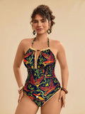 Costume da bagno intero con stampa tropicale blu e bianca a motivi floreali e vegetali, taglio sul retro e vita stretta, casual da spiaggia per vacanze