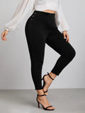 Leggings monocolore con bottone