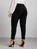 Leggings monocolore con bottone