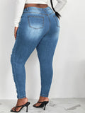 Jeans skinny lavaggio con candeggina con strappati