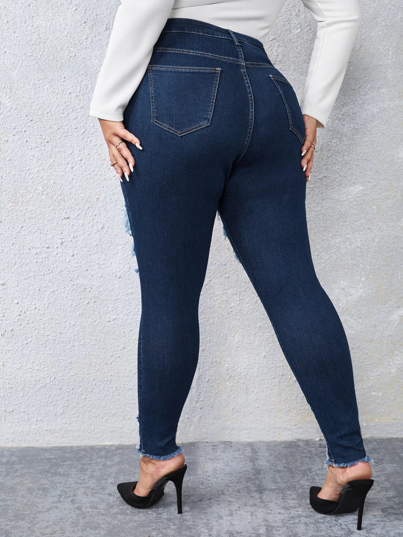 taglie forti Jeans skinny vita alta con strappati con rifinitura grezza
