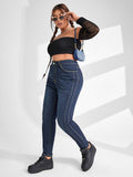 taglie forti Jeans skinny vita alta con dettaglio borchiato