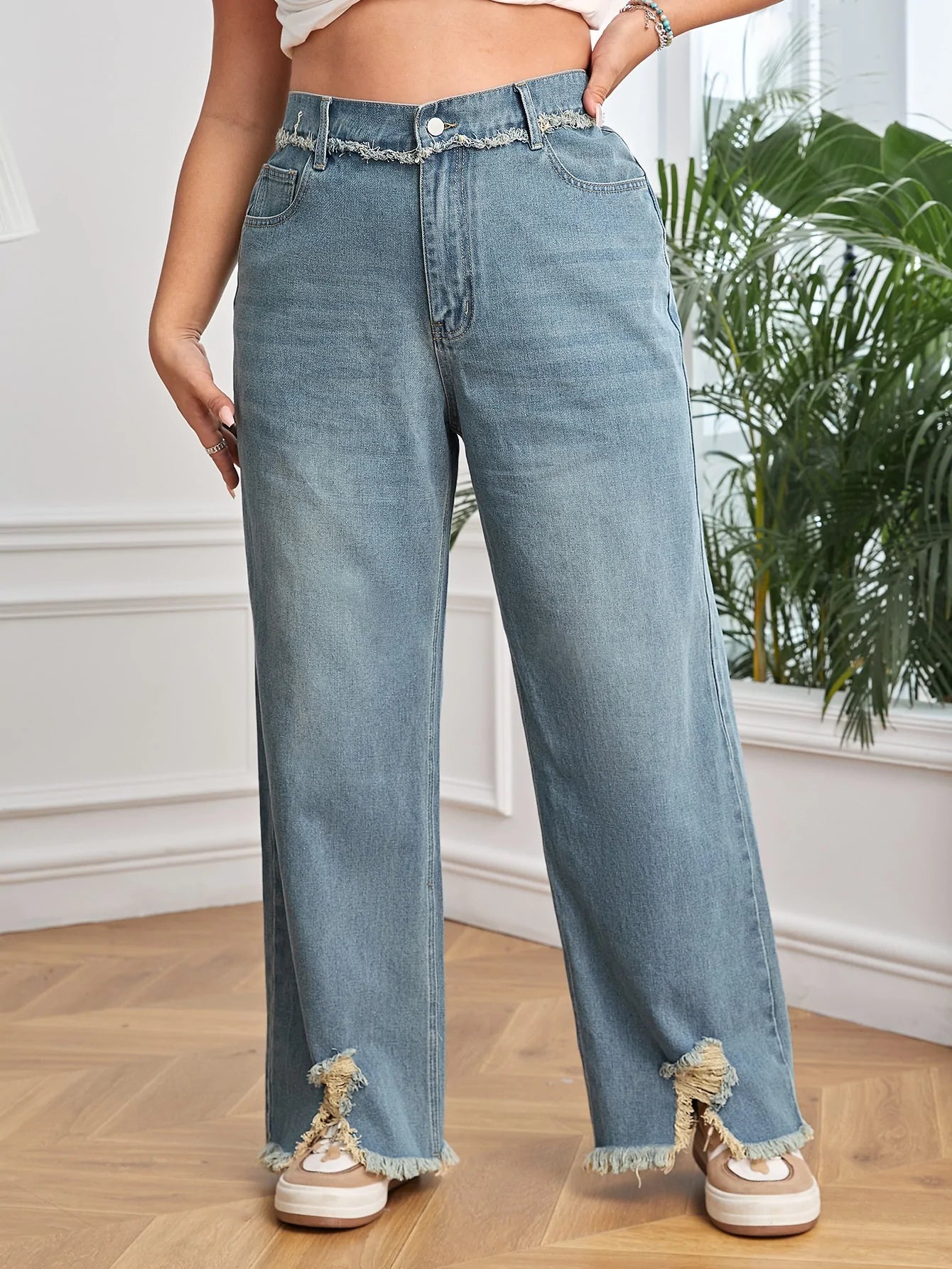 Taglie Forti Jeans con strappati con taglio grezzo orlo asimmetrico