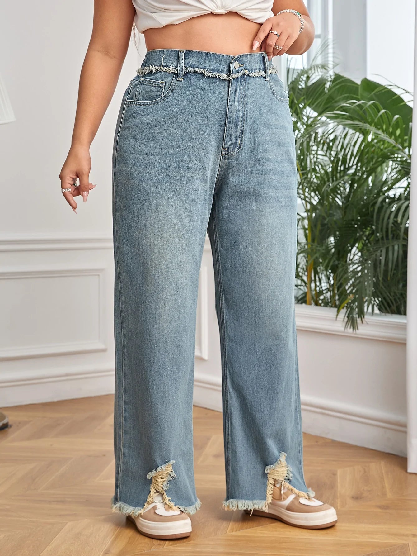 Taglie Forti Jeans con strappati con taglio grezzo orlo asimmetrico