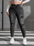 Taglie forti  Jeans skinny lavaggio con candeggina con strappati sfrangiato