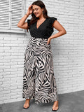 Taglie Forti Jumpsuit gamba larga a righe zebra con bordo a volant senza cintura